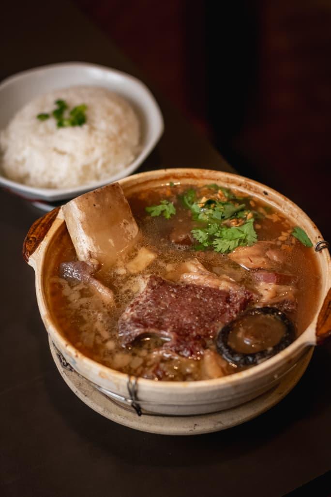Teowkee beef claypot soup served with a bowl of steamed rice