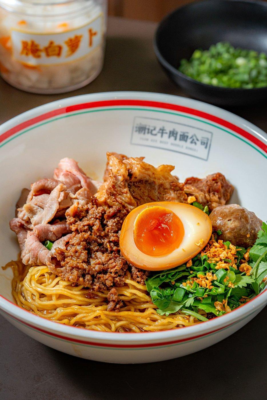 Teowkee dry beef noodles with minced and sliced beef, soft-boiled egg and beef ball
