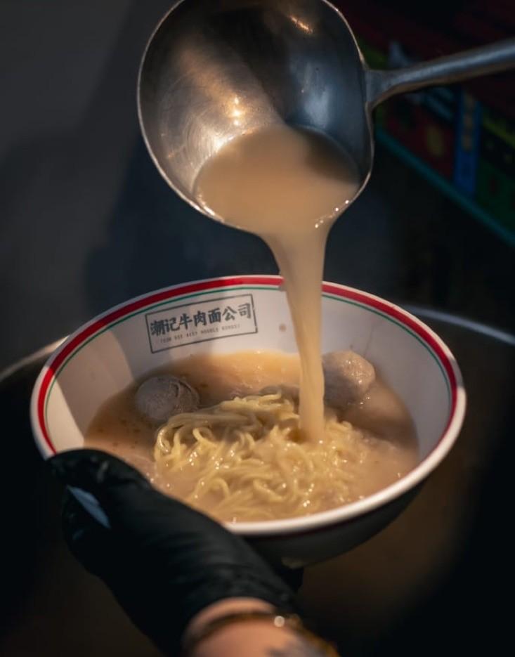 Slow-simmered bone broth poured into a Teowkee bowl